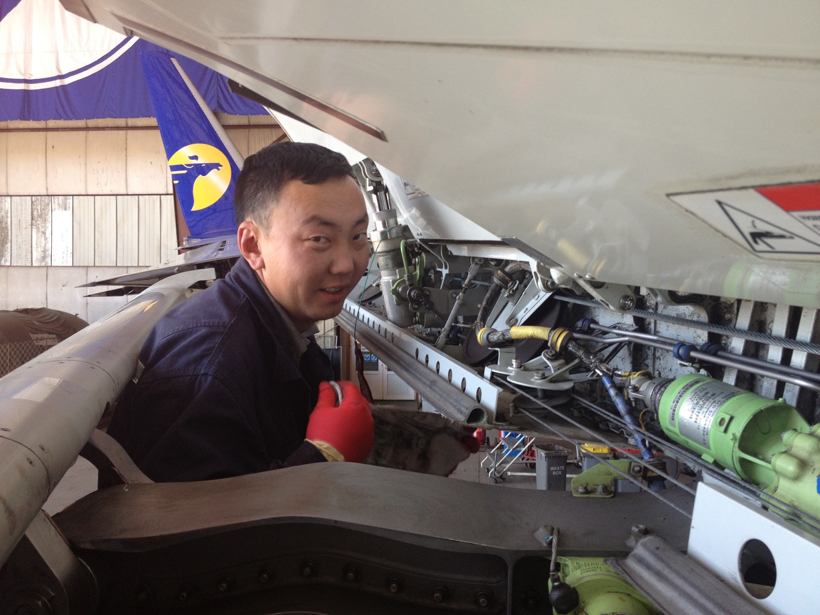 Aircraft maintenance work in a MIAT hangar